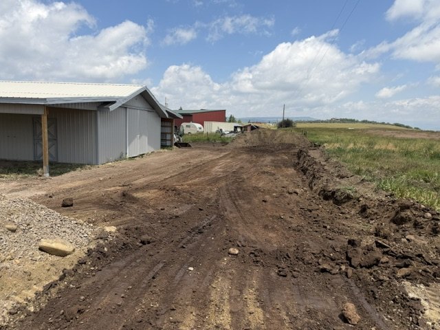 Excavator working on a site in Routt County, Colorado