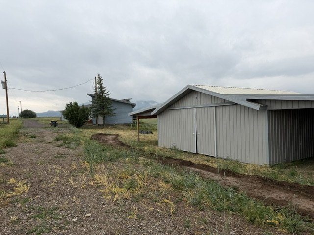 Dream Ridge Excavating equipment on a job site near Toponas, Colorado